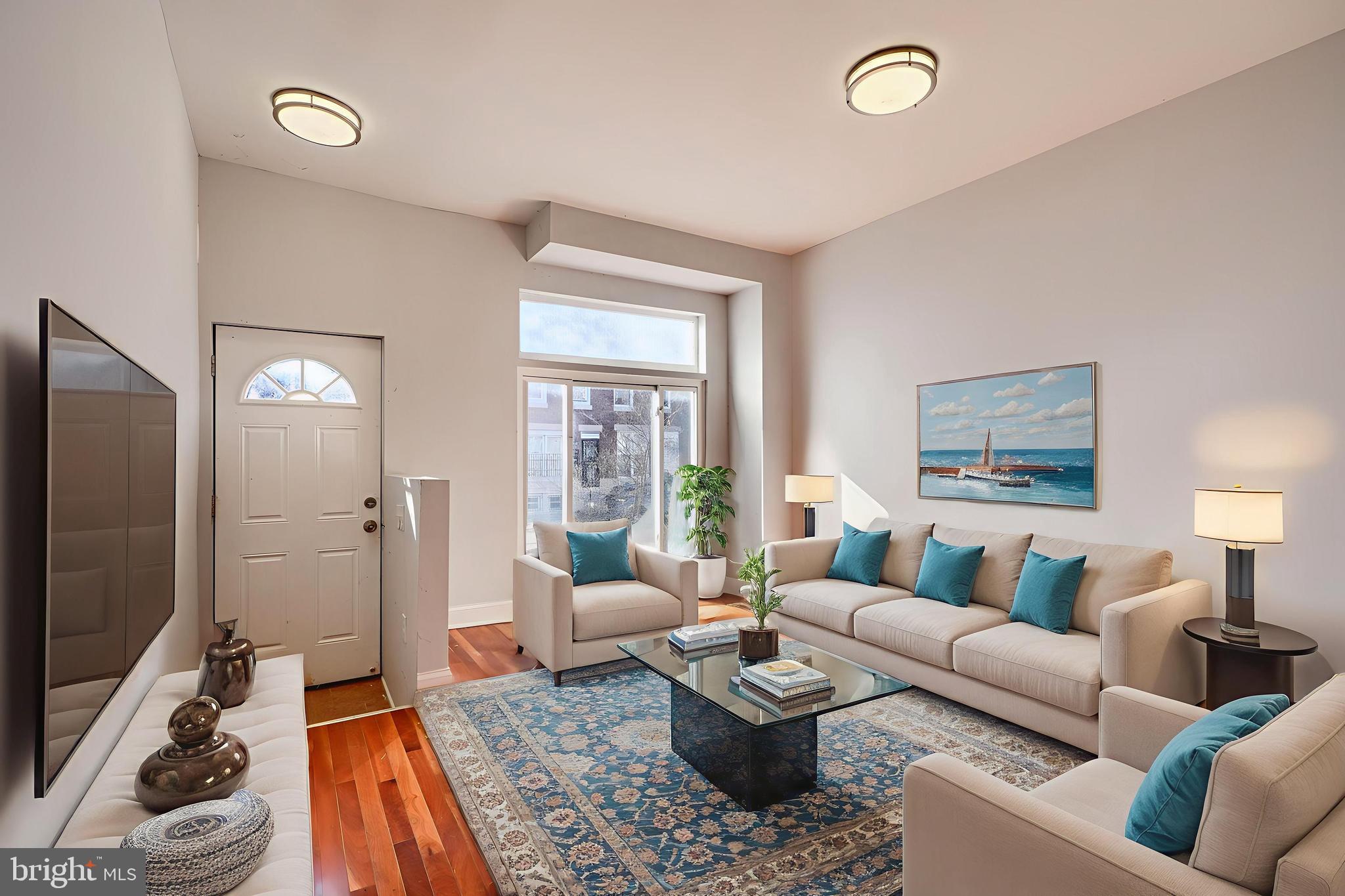 2511 McCulloh Street Baltimore, MD 21217 - Photo 3 of 35 a living room with furniture and a flat screen tv