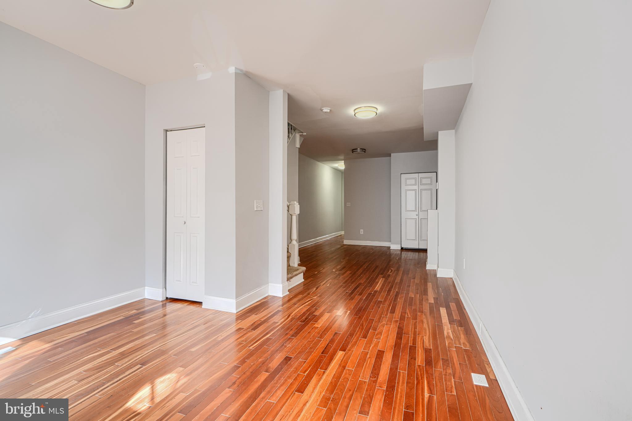 2511 McCulloh Street Baltimore, MD 21217 - Photo 5 of 35 a view of hallway with wooden floor