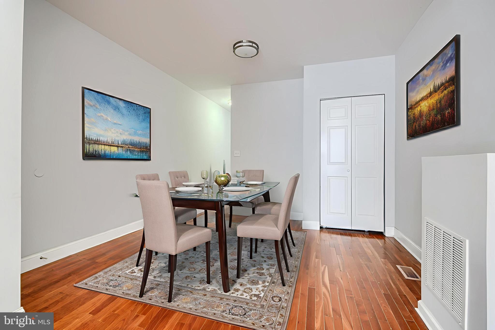 2511 McCulloh Street Baltimore, MD 21217 - Photo 8 of 35 a view of a dining room with furniture and wooden floor