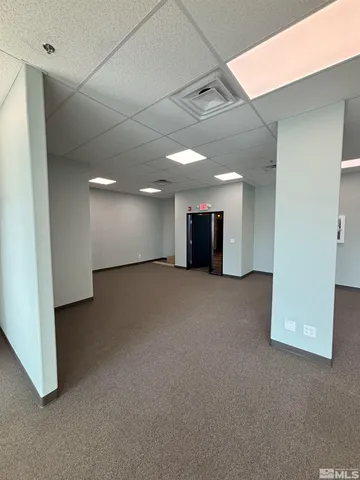 a view of a livingroom with a staircase