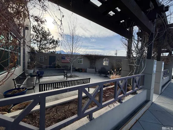 a view of balcony with furniture