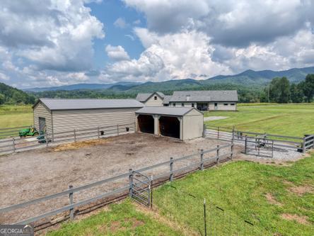 186 Rice Landing Hayesville, NC 28904 - Photo 27 of 77 a view of a terrace with a garden