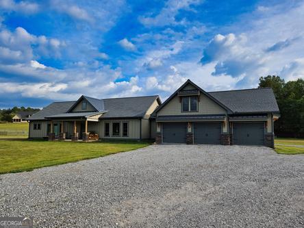 186 Rice Landing Hayesville, NC 28904 - Photo 34 of 77 front view of house with a yard