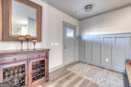 186 Rice Landing Hayesville, NC 28904 - Photo 35 of 77 a spacious bathroom with a granite countertop sink and a mirror