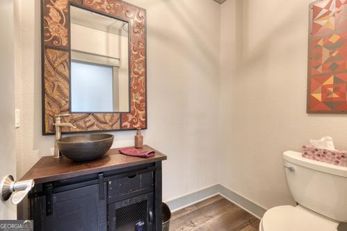 186 Rice Landing Hayesville, NC 28904 - Photo 53 of 77 a bathroom with a toilet and a mirror