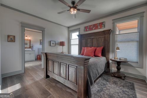 186 Rice Landing Hayesville, NC 28904 - Photo 62 of 77 a bed room with a bed and a chandelier