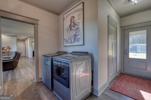 186 Rice Landing Hayesville, NC 28904 - Photo 72 of 77 a view of livingroom with washer and dryer