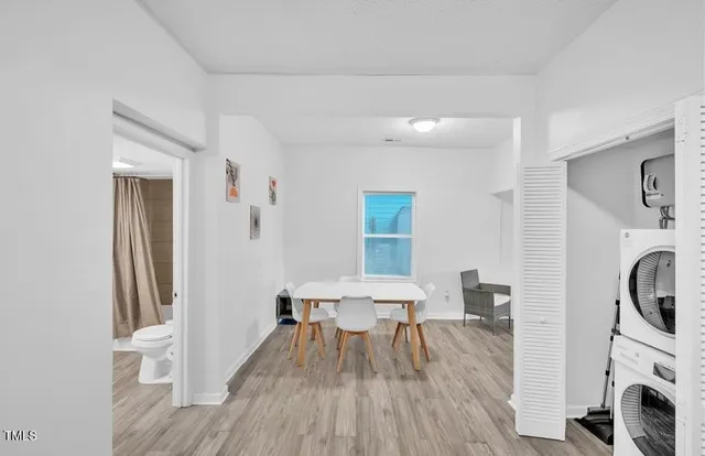 a view of a livingroom with furniture and a fireplace