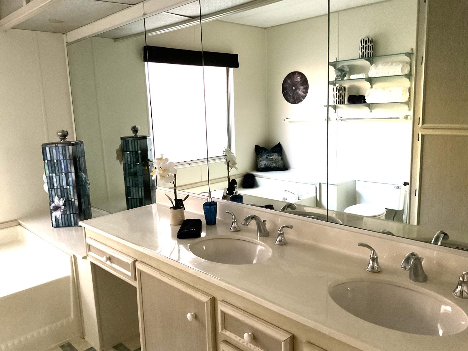 10124 Hidden Springs Drive Grass Valley, CA 95949 - Photo 21 of 27 a bathroom with a double vanity sink mirror and shower