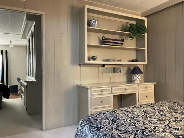a kitchen with stainless steel appliances a stove and a cabinets