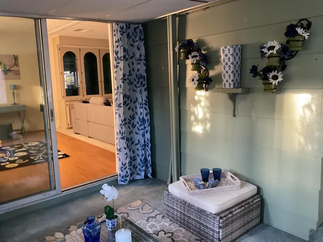 a bathroom with a sink mirror and shower