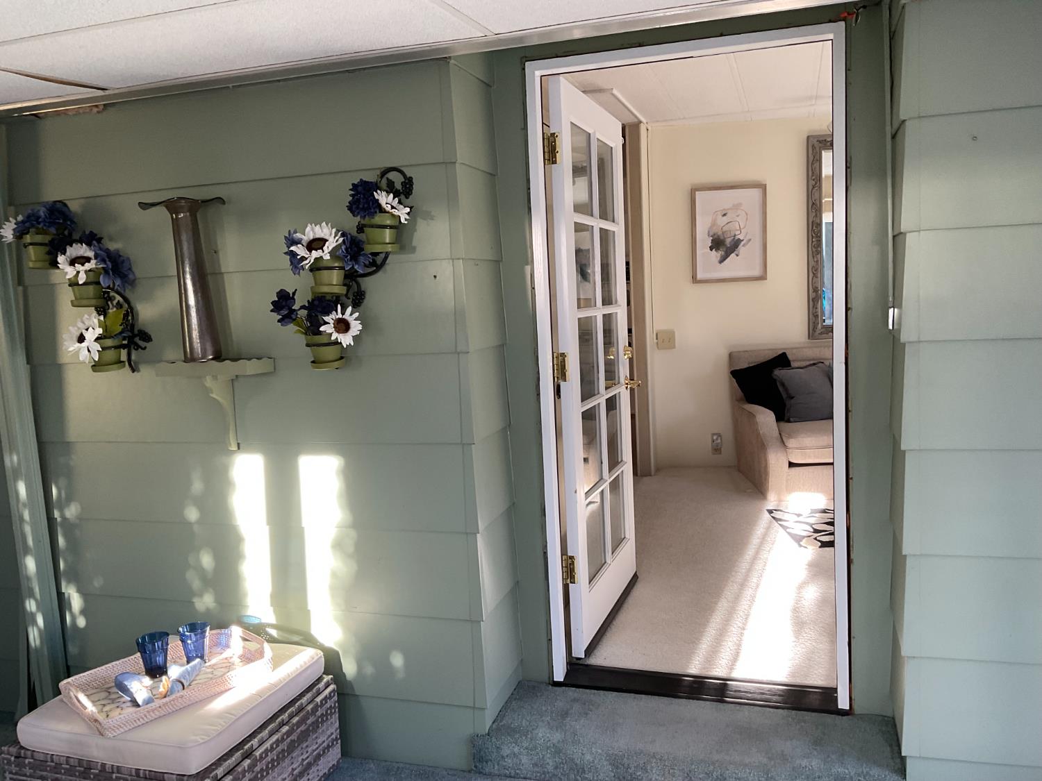 10124 Hidden Springs Drive Grass Valley, CA 95949 - Photo 7 of 27 a view of a hallway with wooden floor and a living room