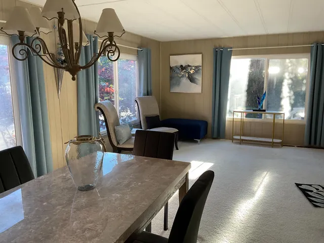 a view of a dining room with furniture