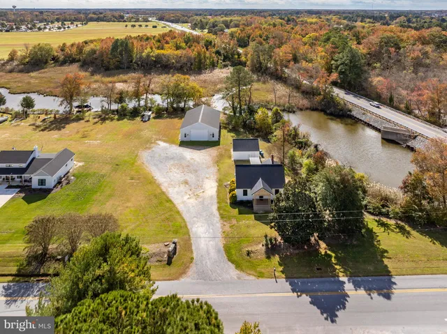 an aerial view of lake residential house and outdoor space