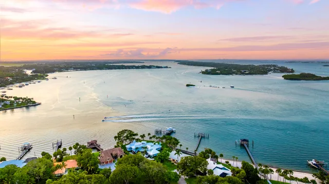 a view of a lake with a big yard