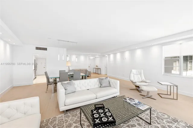 a living room with furniture and a couch