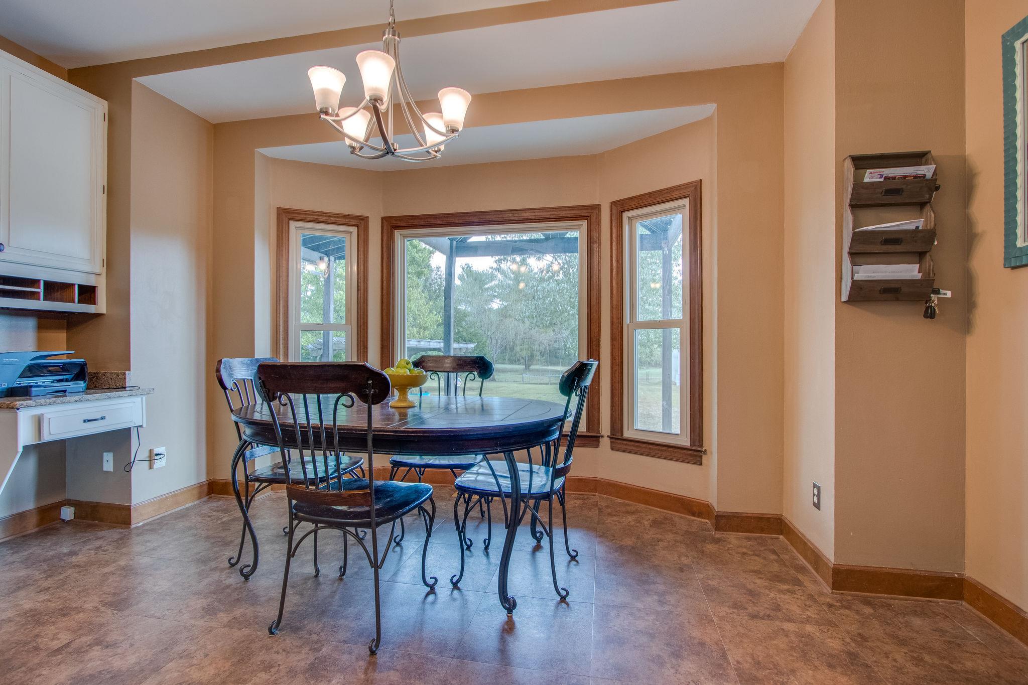 1105 Kathryn Road Mount Juliet, TN 37122 - Photo 13 of 30 a view of a dining room with furniture window and outside view