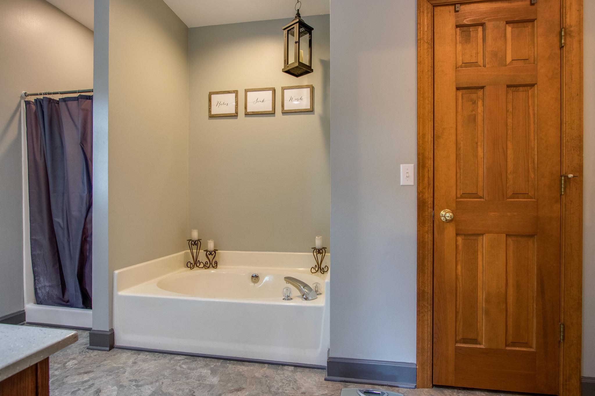 1105 Kathryn Road Mount Juliet, TN 37122 - Photo 17 of 30 a bathroom with a bathtub and shower