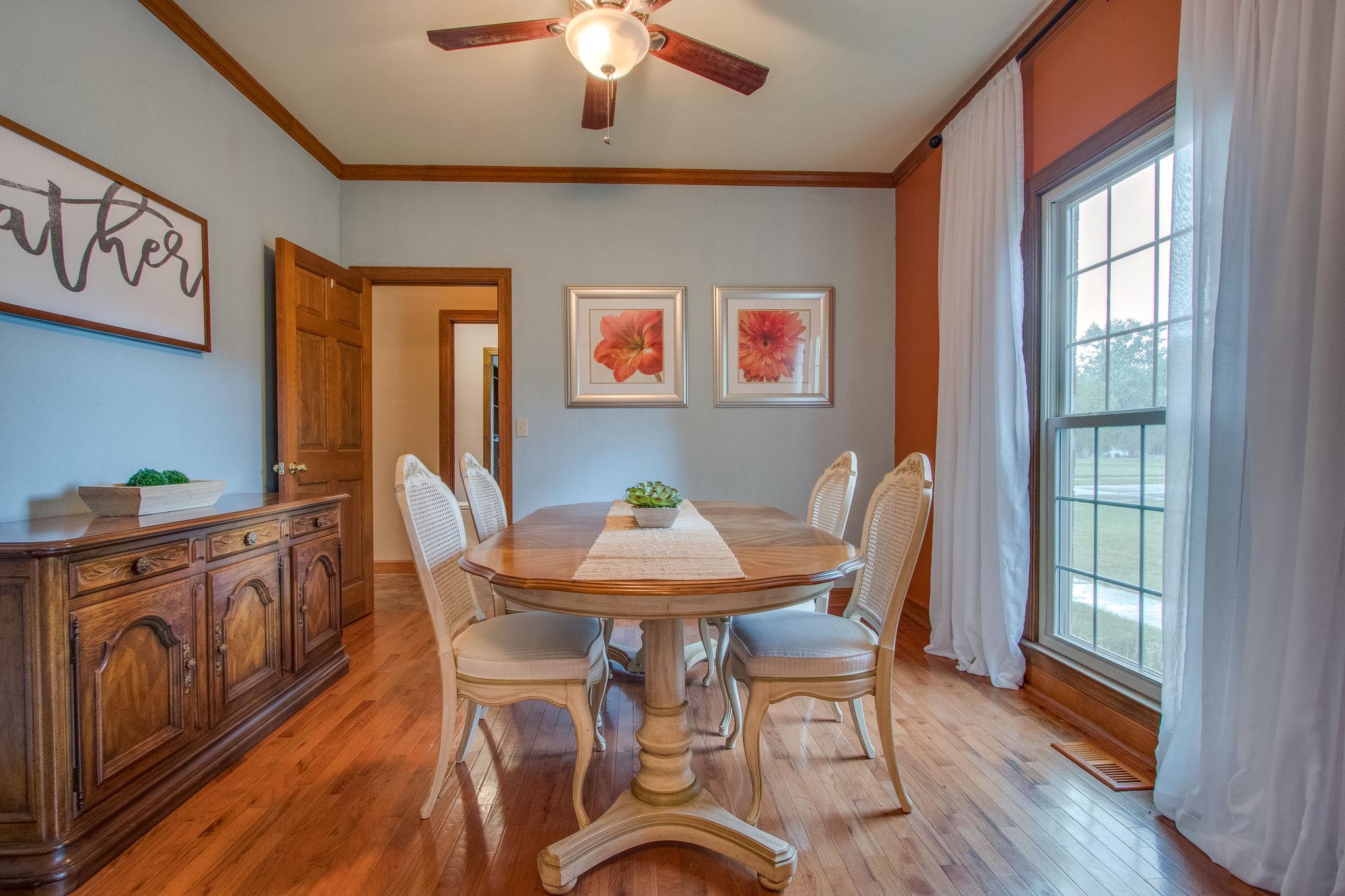 1105 Kathryn Road Mount Juliet, TN 37122 - Photo 3 of 30 a view of a dining room with furniture window and wooden floor