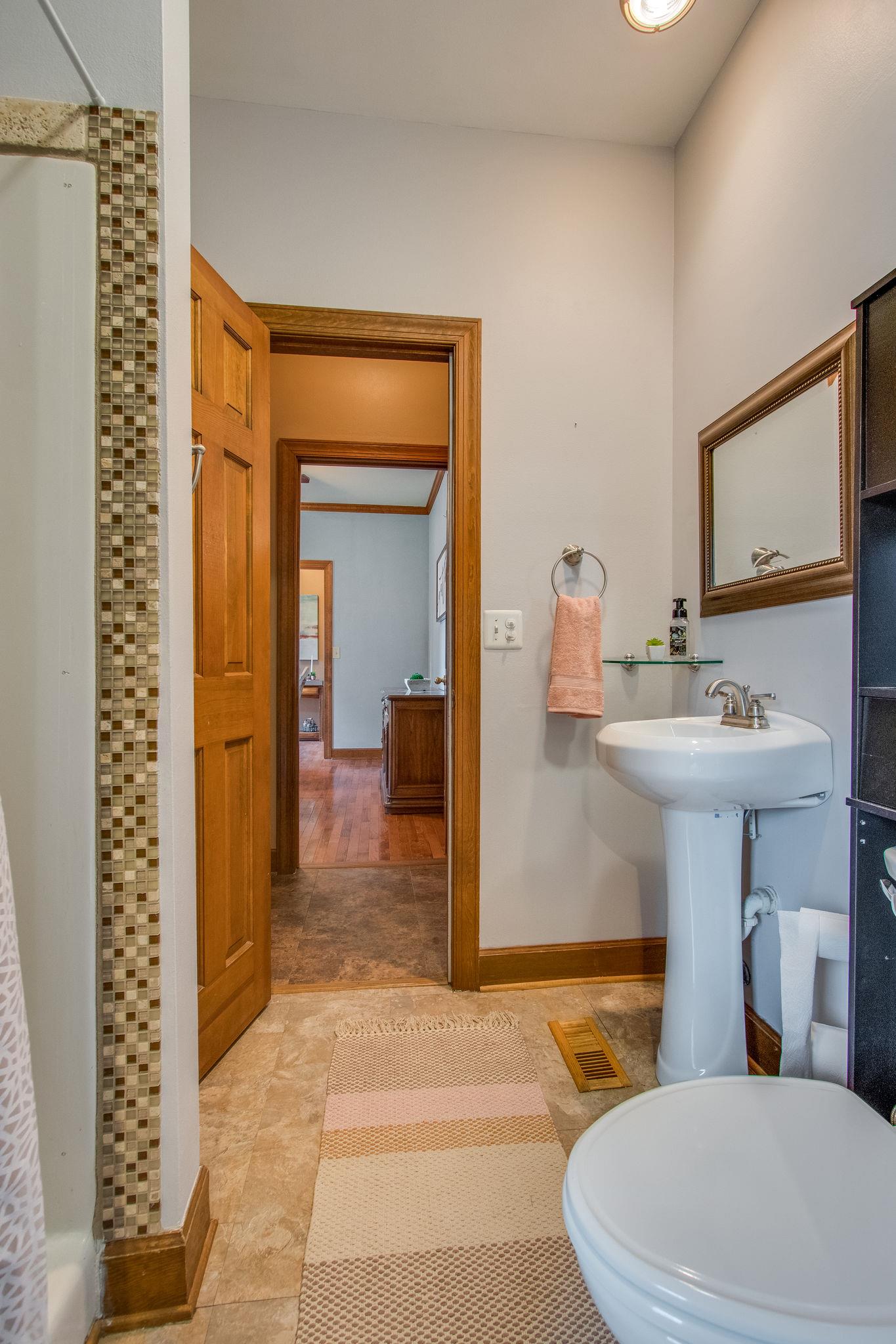 1105 Kathryn Road Mount Juliet, TN 37122 - Photo 22 of 30 a bathroom with a sink a toilet and shower
