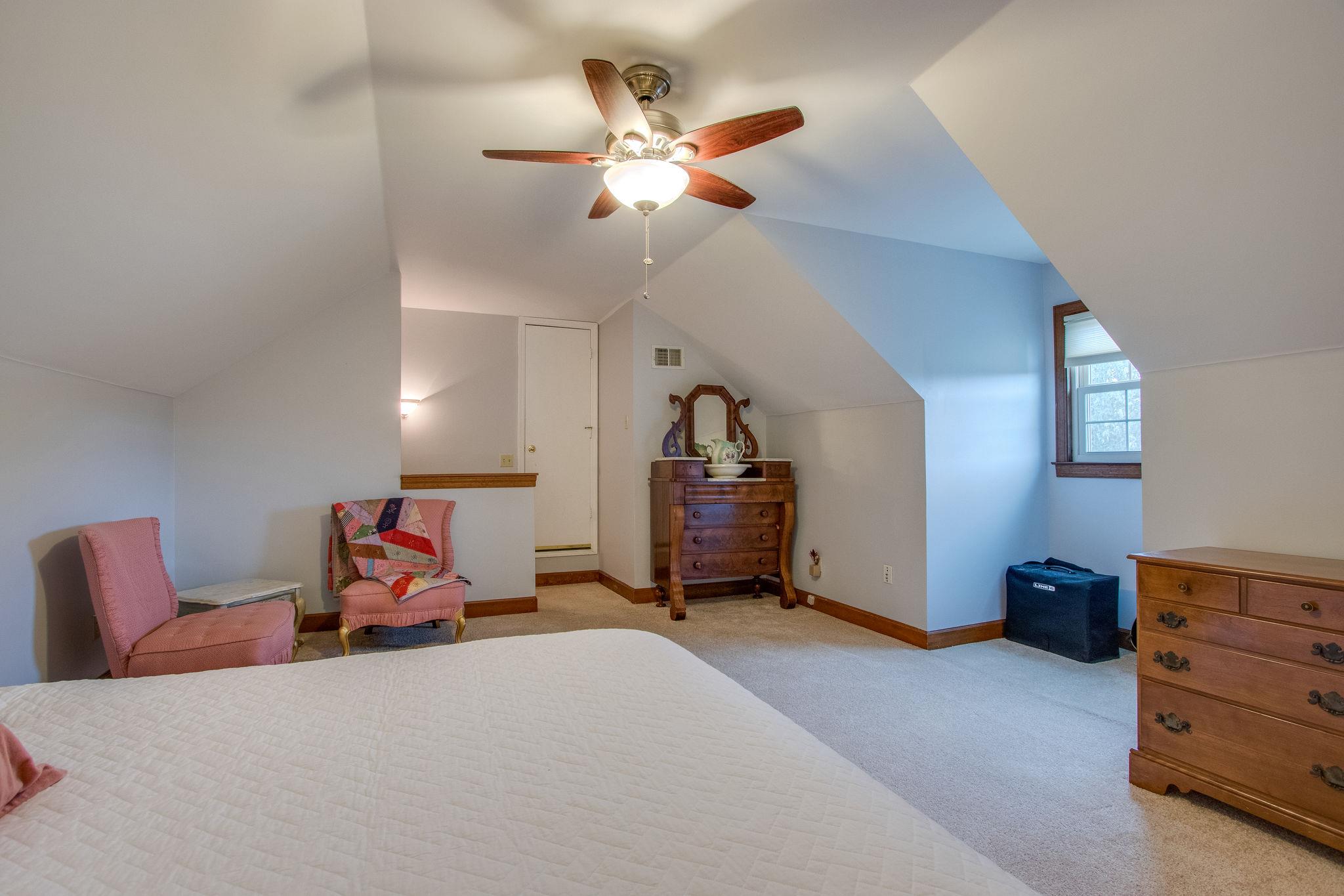 1105 Kathryn Road Mount Juliet, TN 37122 - Photo 24 of 30 a bed room with furniture and a ceiling fan
