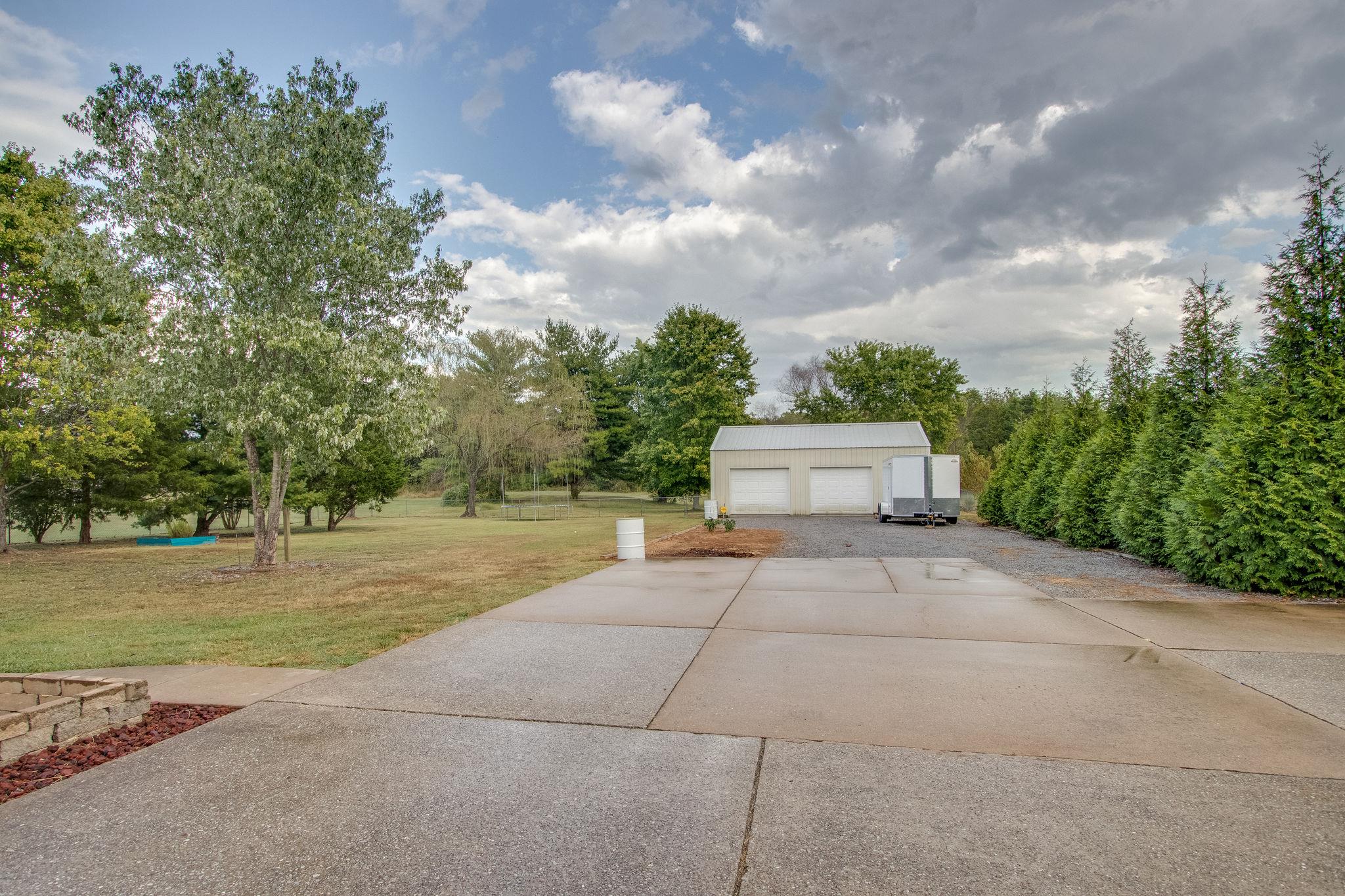 1105 Kathryn Road Mount Juliet, TN 37122 - Photo 29 of 30 front view of a house with a yard and trees