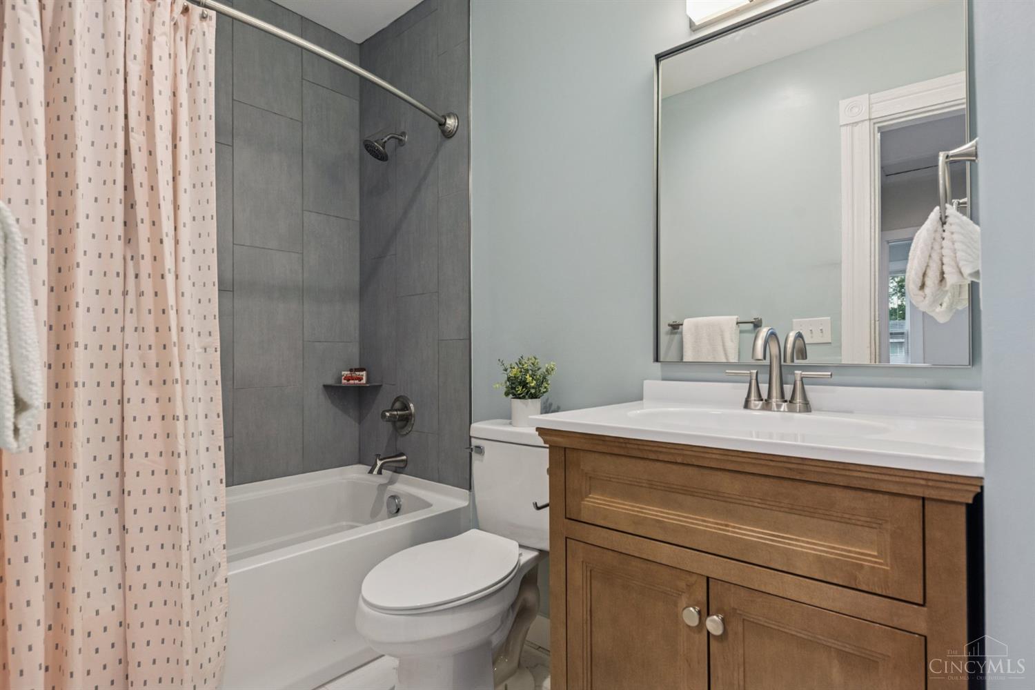 6124 Roe Street Cincinnati, OH 45227 - Photo 48 of 61 2nd Full Bath - New fixtures, lighting, shower/tub, flooring & more.