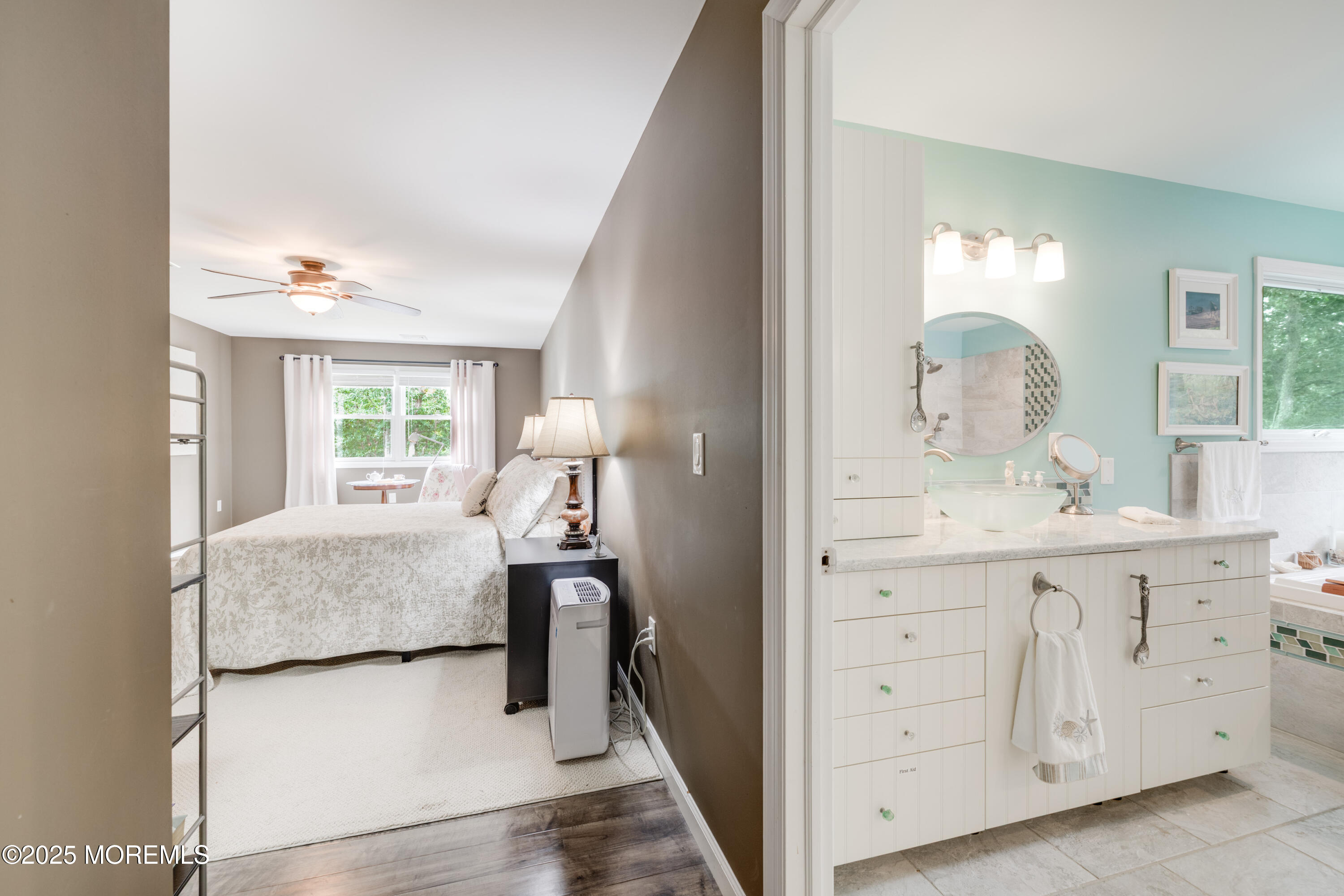 501 Newtons Corner Road Howell, NJ 07731 - Photo 16 of 29 a en suite bathroom with a double vanity sink and a mirror
