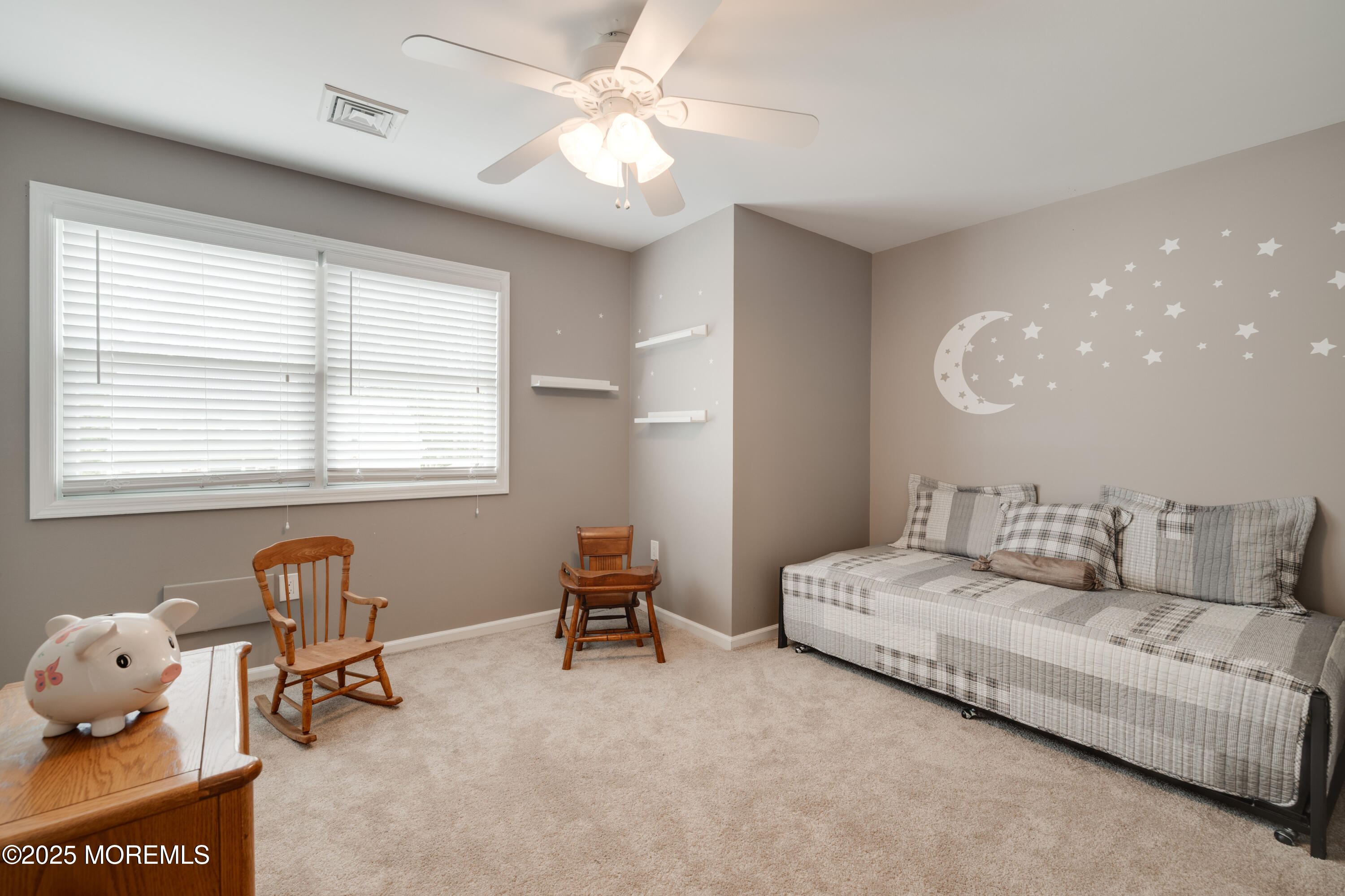 501 Newtons Corner Road Howell, NJ 07731 - Photo 4 of 29 a living room with furniture and a ceiling fan
