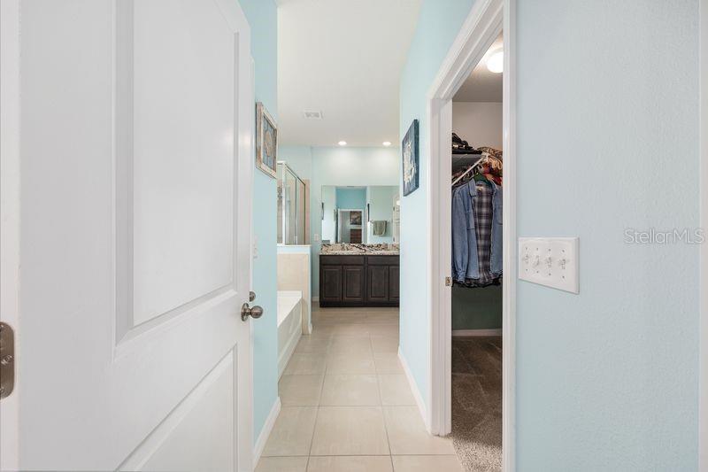 5077 Northeast 16th Street Ocala, FL 34470 - Photo 24 of 47 a view of a hallway with a livingroom and a hallway