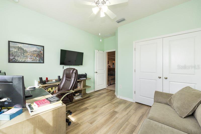 5077 Northeast 16th Street Ocala, FL 34470 - Photo 33 of 47 a view of a workspace with furniture and a window