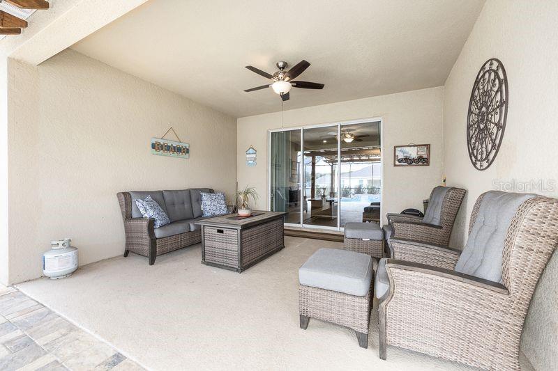 5077 Northeast 16th Street Ocala, FL 34470 - Photo 35 of 47 a living room with furniture and a large window