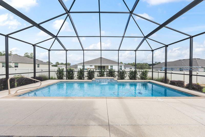5077 Northeast 16th Street Ocala, FL 34470 - Photo 5 of 47 a view of a swimming pool
