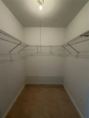 a view of a room with racks on the wall