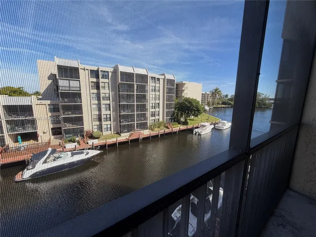 a view of a lake from a balcony