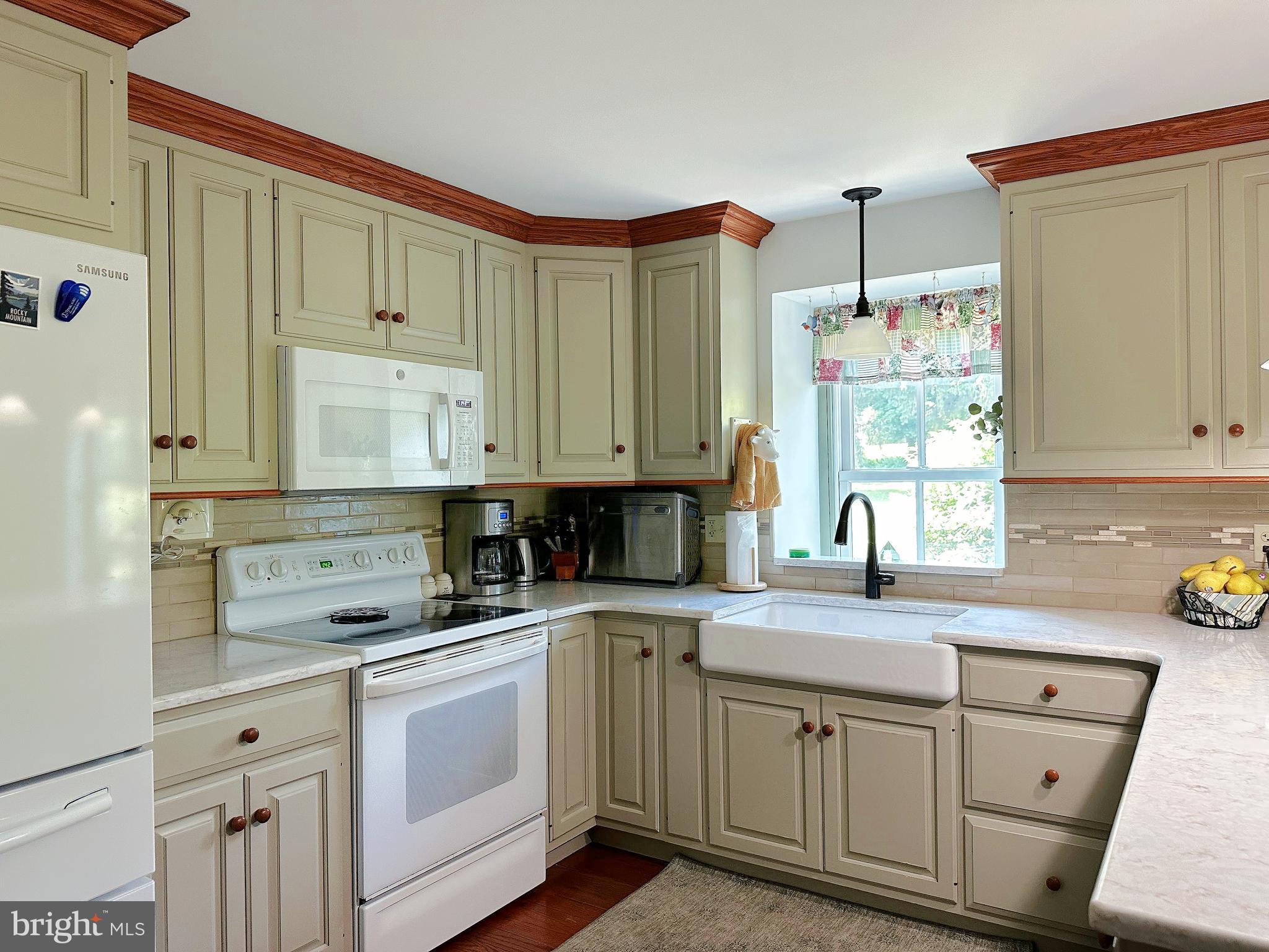 2382 Bergey Road Harleysville, PA 19438 - Photo 24 of 52 a kitchen with cabinets appliances a sink and a window