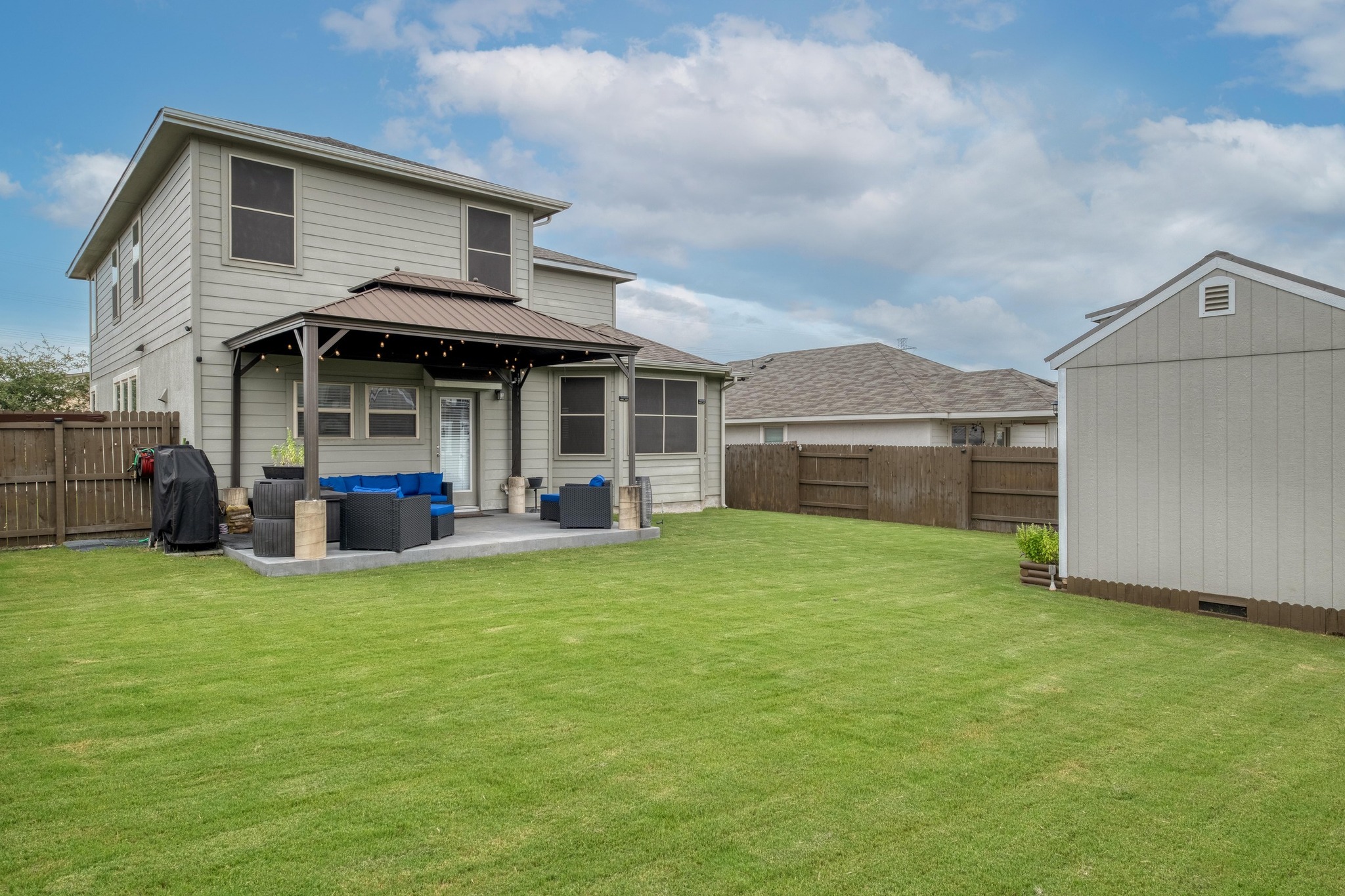 19028 Quebrada Drive Pflugerville, TX 78660 - Photo 28 of 36 a view of a house with a yard and a garden
