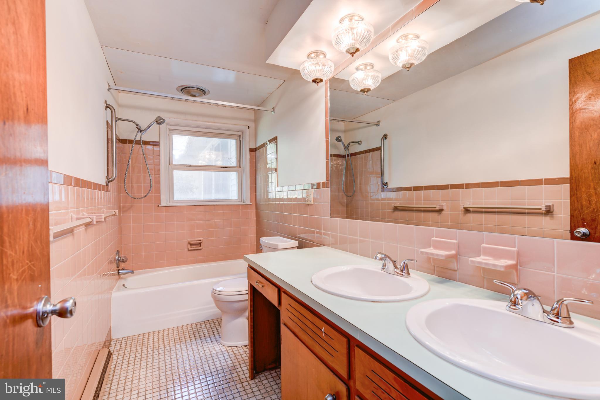 2476 Hopewell Road Elverson, PA 19520 - Photo 22 of 47 Hall Bath w. Dual Vanity and Tile Floors