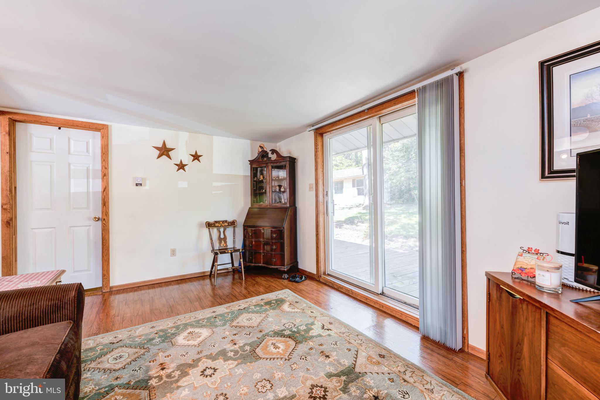 2476 Hopewell Road Elverson, PA 19520 - Photo 32 of 47 Apartment Living room w. Slider to Back Deck