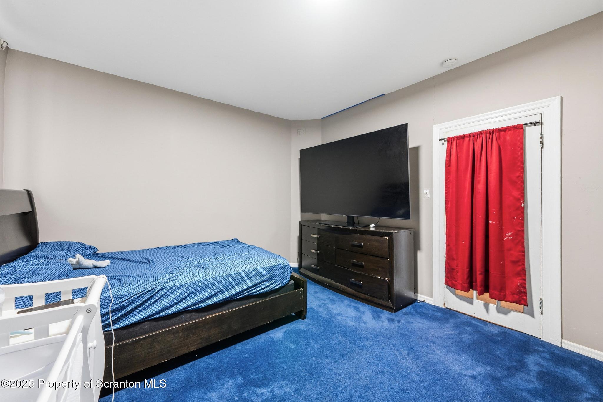 518 Prospect Avenue Scranton, PA 18505 - Photo 23 of 59 a living room with furniture and a flat screen tv