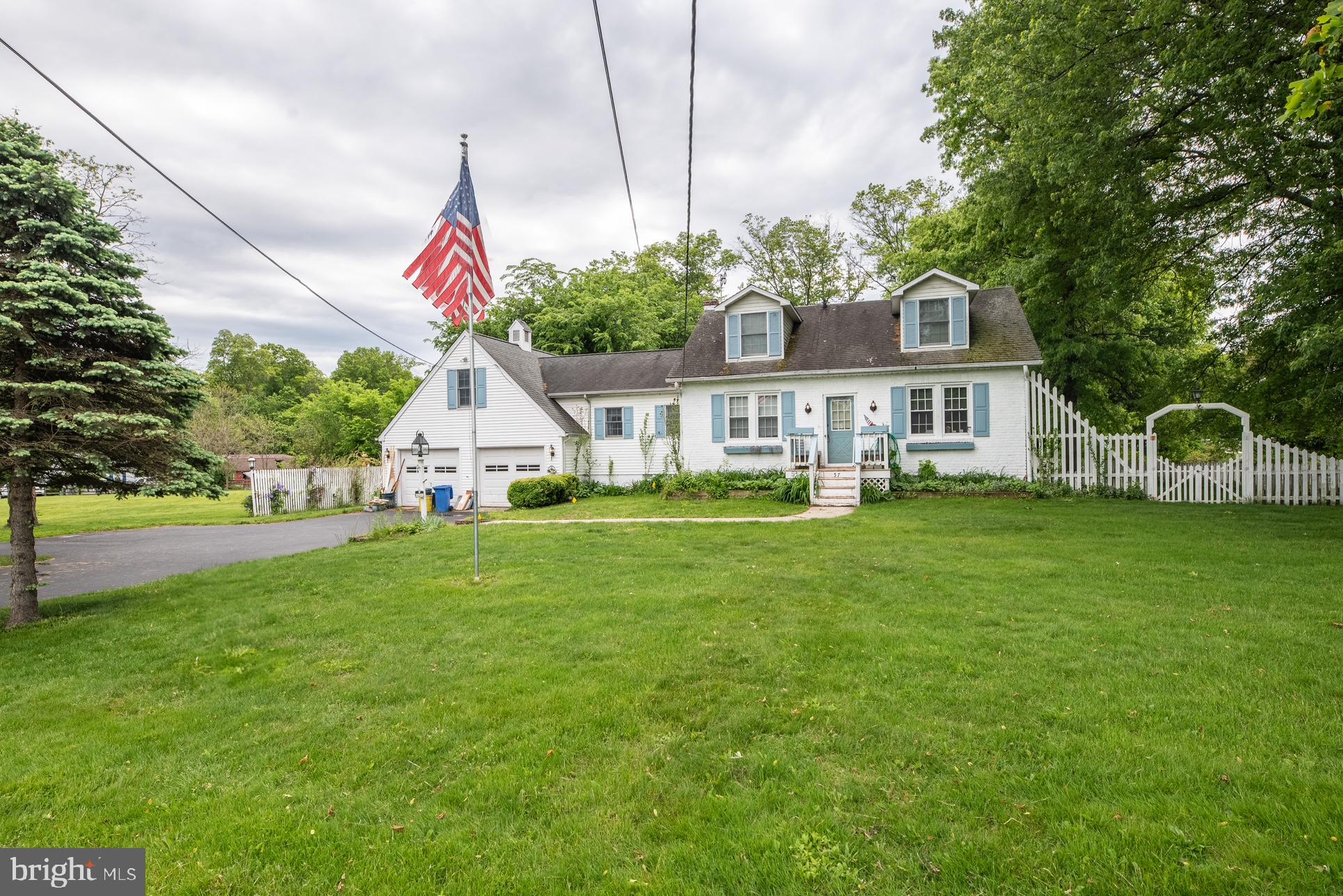 57 Diverty Road Pennington, NJ 08534 - Photo 2 of 86 Charming home with lush green lawn.