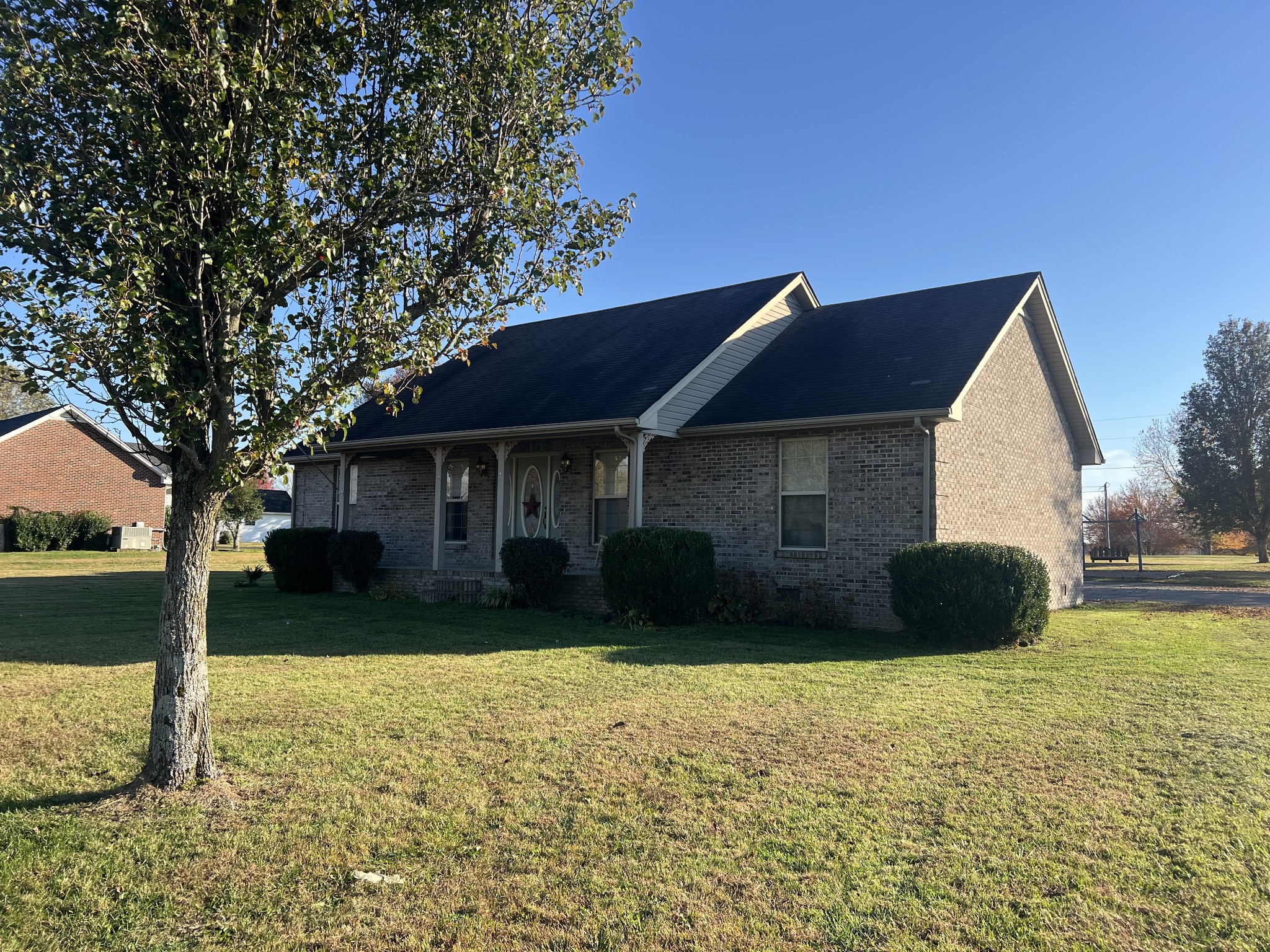251 Walton Chapel Road Lafayette, TN 37083 - Photo 1 of 16 a front view of a house with a yard