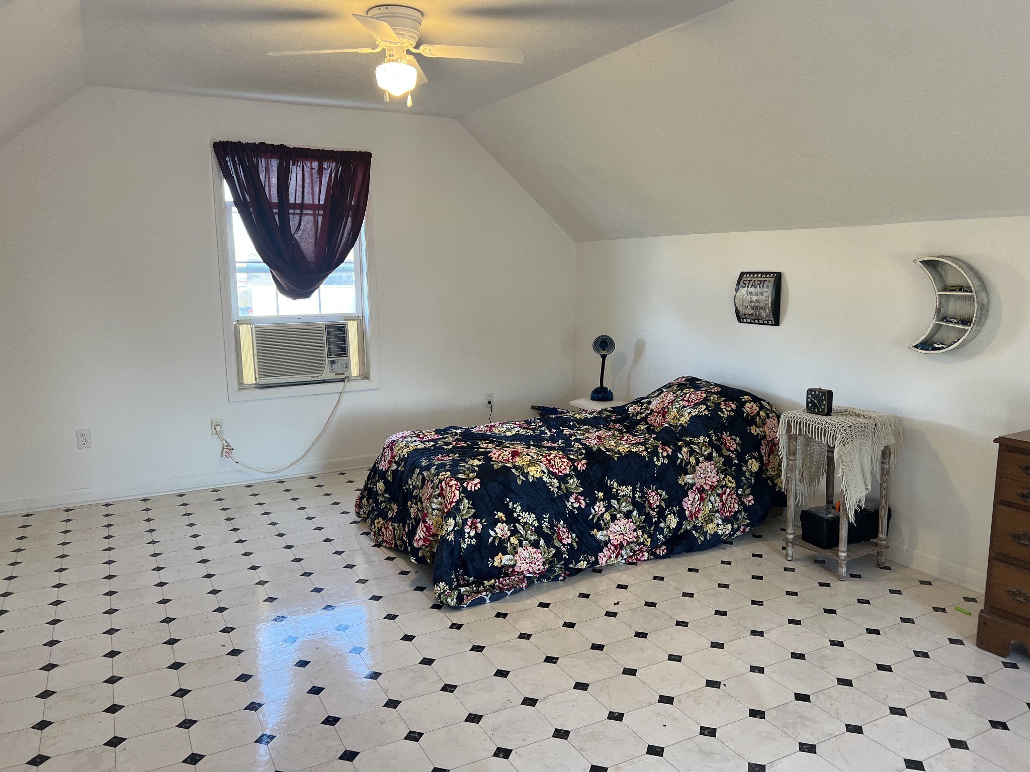 251 Walton Chapel Road Lafayette, TN 37083 - Photo 13 of 16 a bedroom with a bed and a painting on the wall