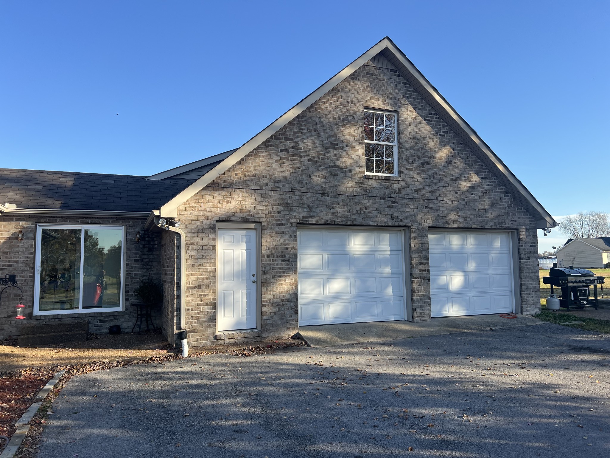 251 Walton Chapel Road Lafayette, TN 37083 - Photo 15 of 16 a front view of a house with a yard