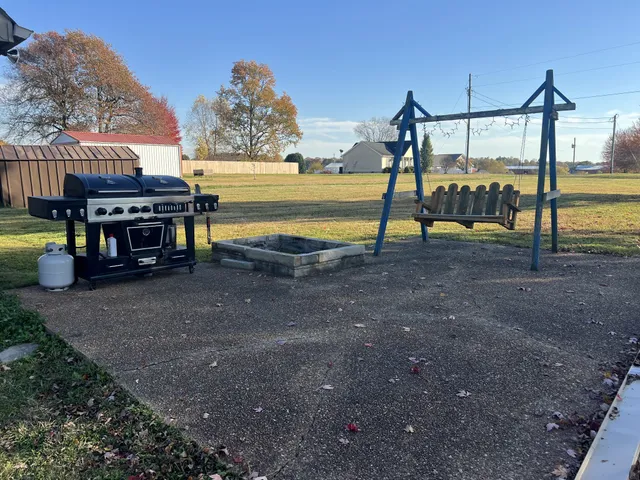 a view of a swimming pool with an outdoor space