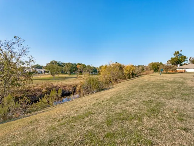 a view of a lake with houses