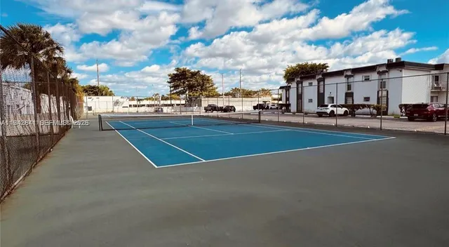 a view of a chairs and tables in patio