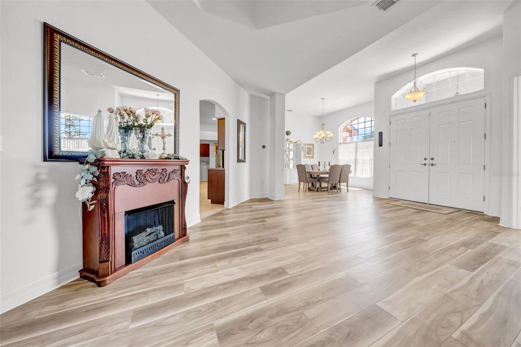 10177 Deer Street Spring Hill, FL 34608 - Photo 17 of 73 a view of living room with furniture and fireplace