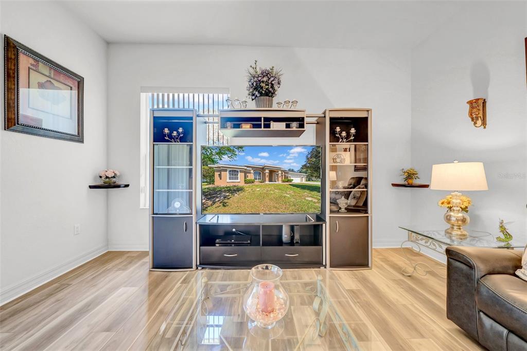 10177 Deer Street Spring Hill, FL 34608 - Photo 31 of 73 a view of living room with furniture and window