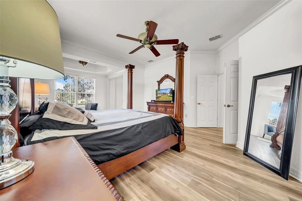 10177 Deer Street Spring Hill, FL 34608 - Photo 33 of 73 a bed room with a bed window and a ceiling fan